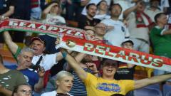 Belarus fans wave their scarves